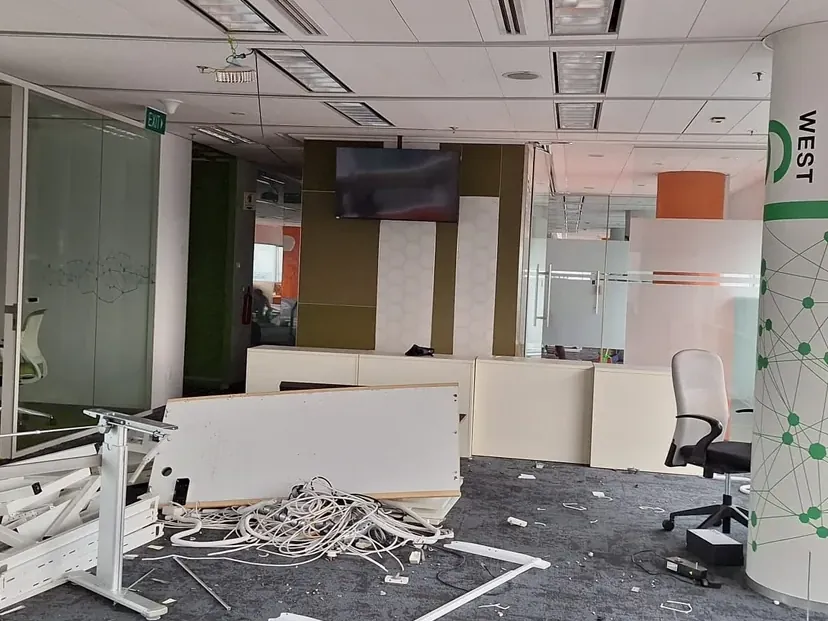 Glass partitions being removed during an office reinstatement