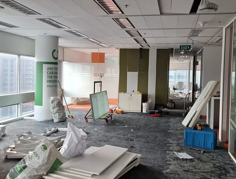 Office fit-out being dismantled, a key driver of reinstatement cost in Singapore